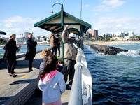 catching-fish-at-st-kilda-pier_27204070517_o